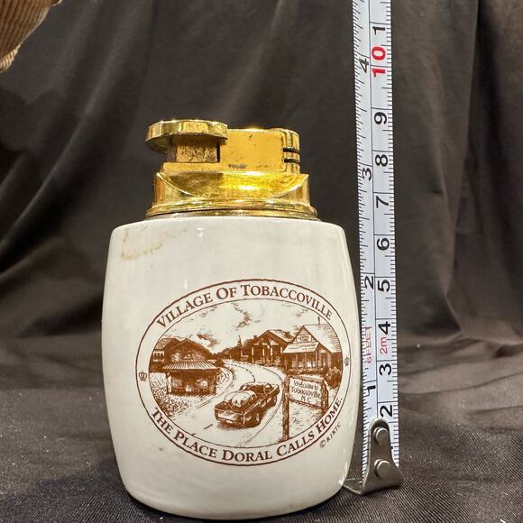 Vtg Doral Refillable Lighter Village of Tobaccoville The Place Doral Calls Home - Picture 6 of 8